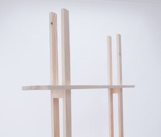 Top shelf passing between the paired battens