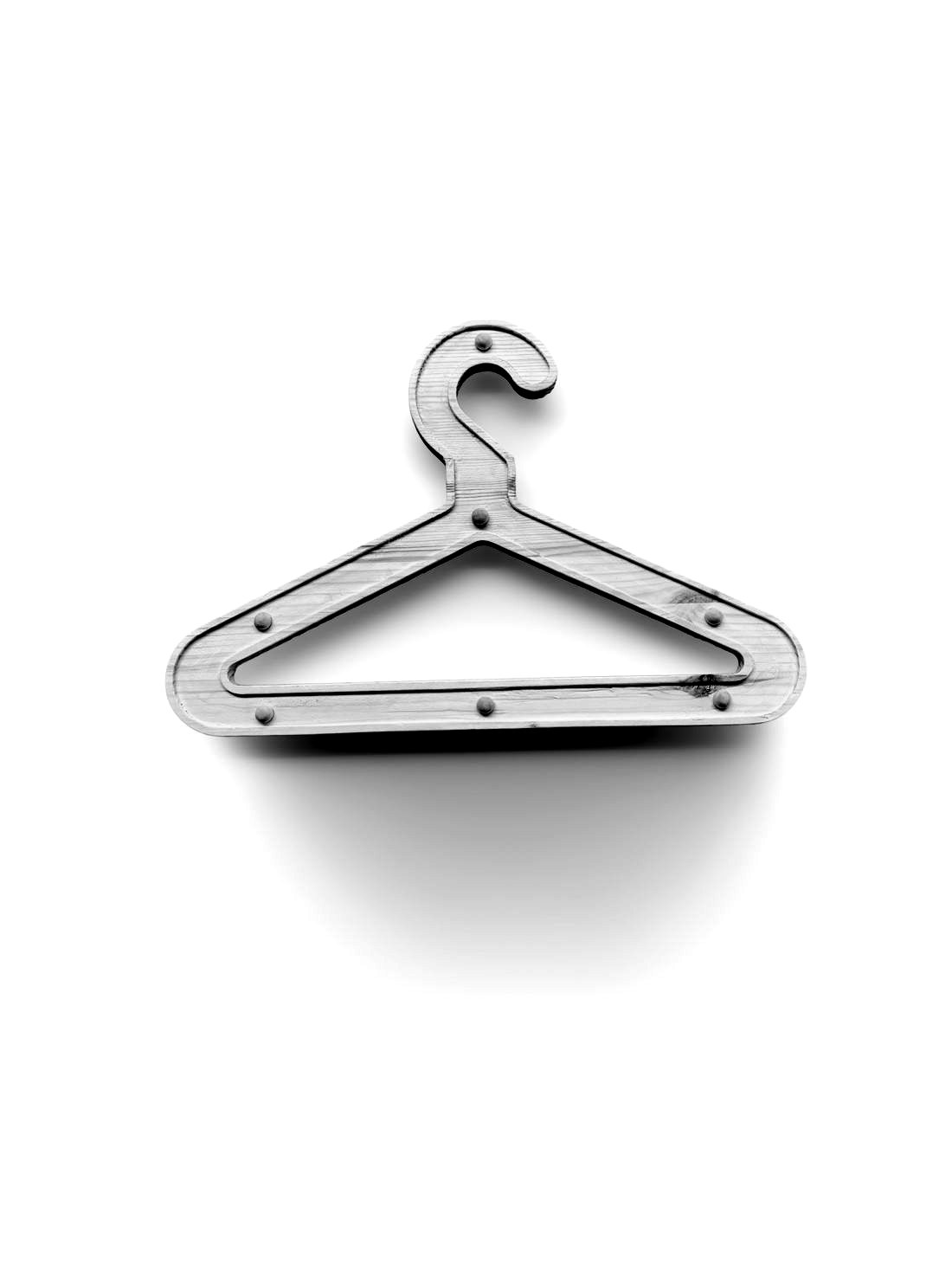 Girder Hanger, a pine coat hanger with a routed outline and dowel details