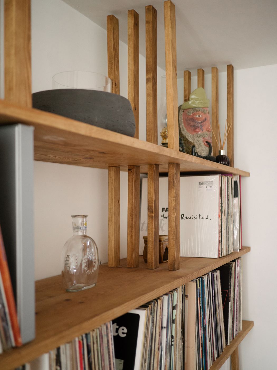 Close-up of the upright posts rising through the top shelves
